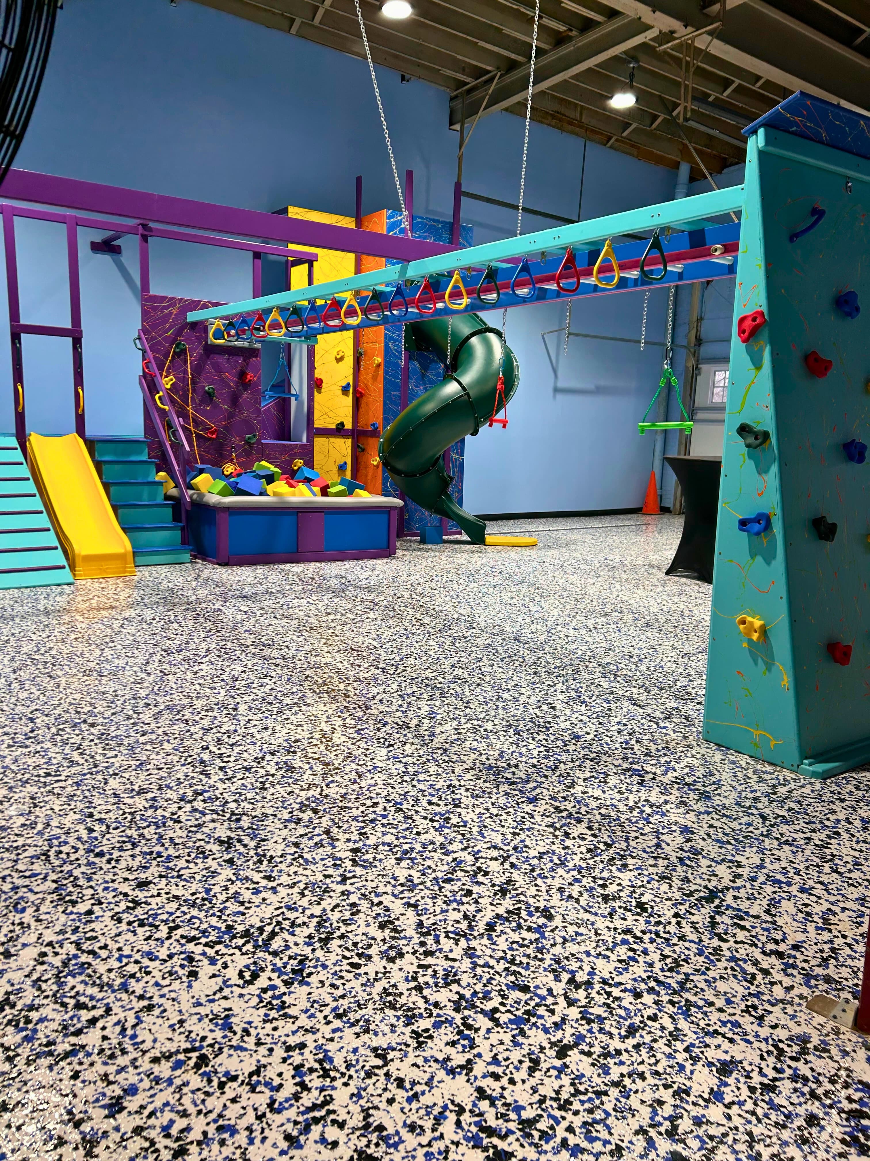 Commercial sensory gym with overhead swing system