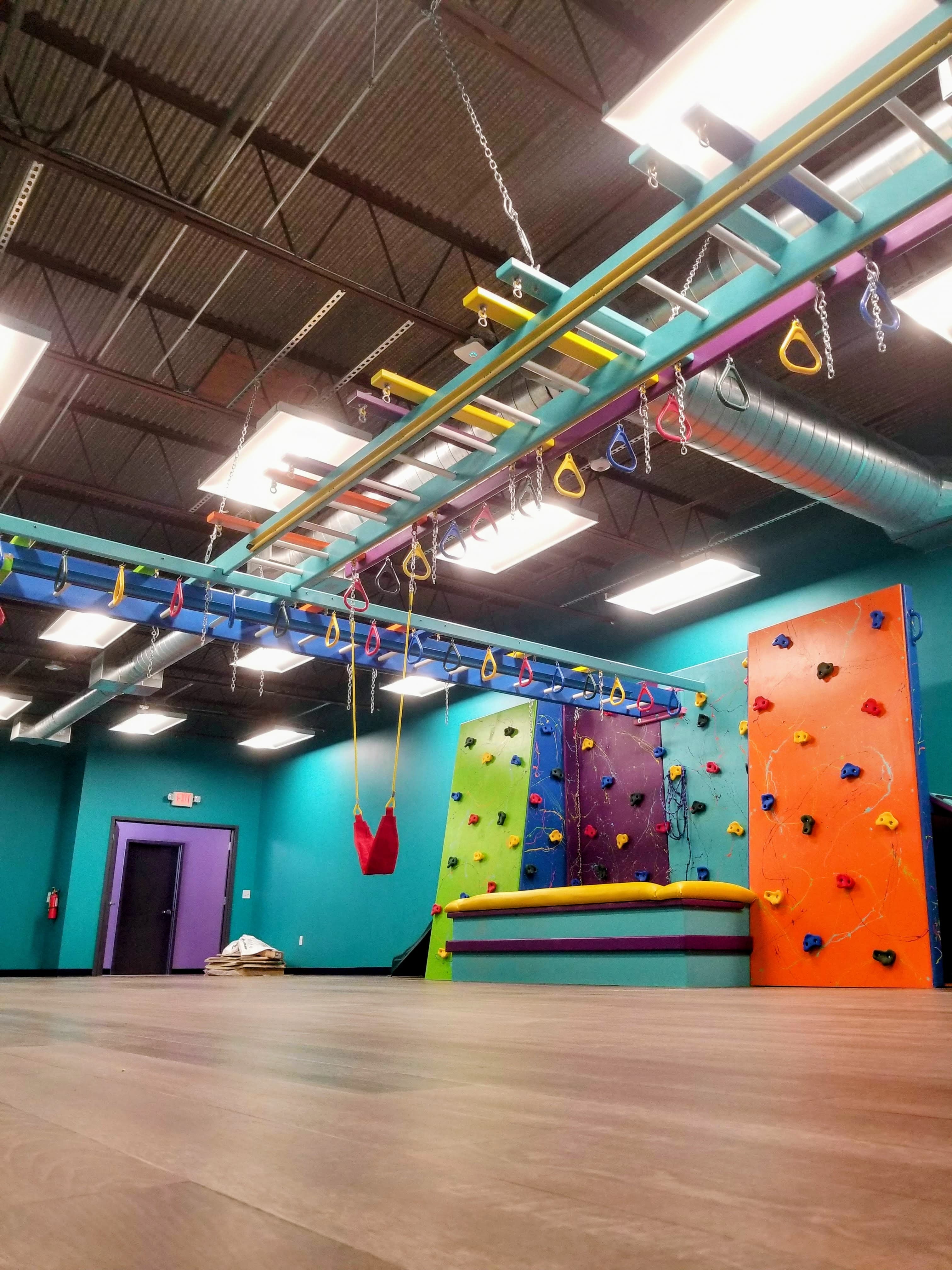 ABA therapy sensory gym with ball pit and swing stations