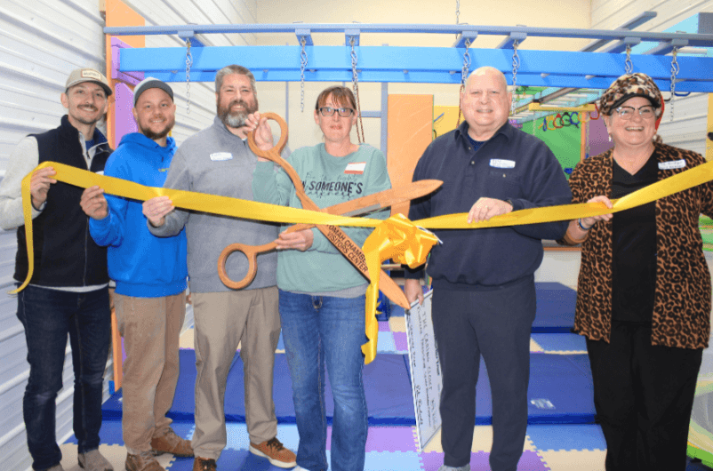 Spectrum Sensory Gyms ribbon cutting ceremony with team members