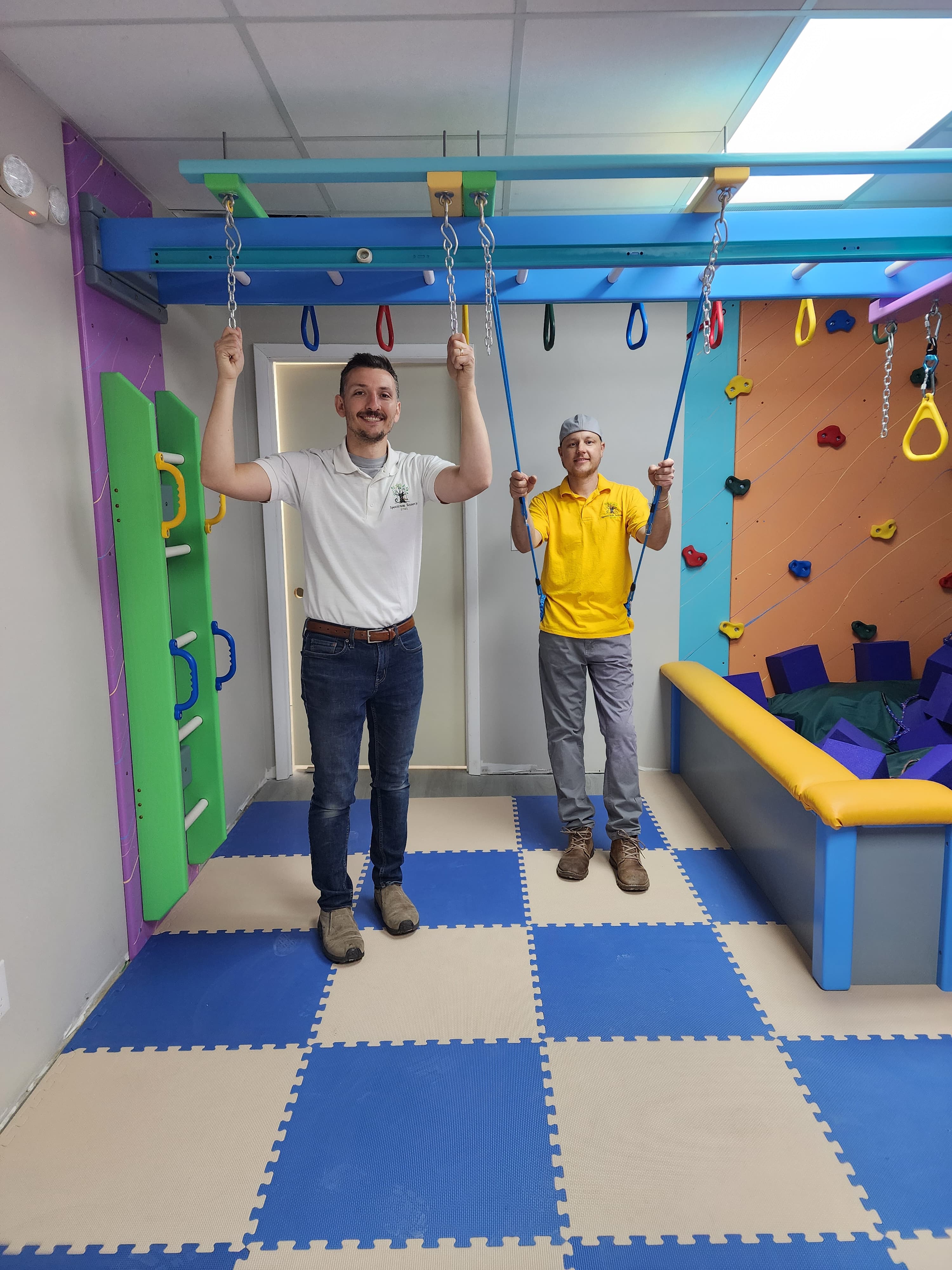 Spectrum Sensory Gyms team celebrating a completed gym installation